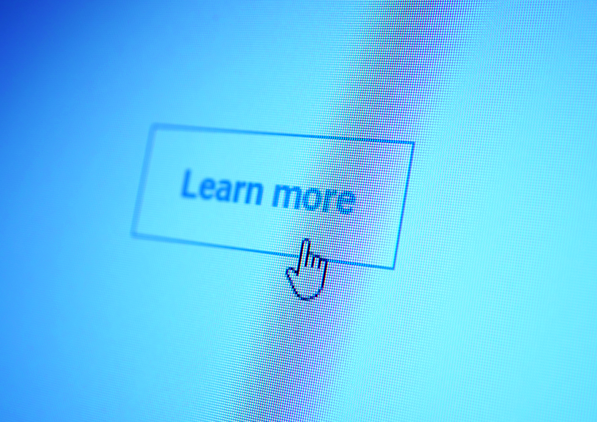 Cursor clicking a “Learn more” call-to-action button on a website interface