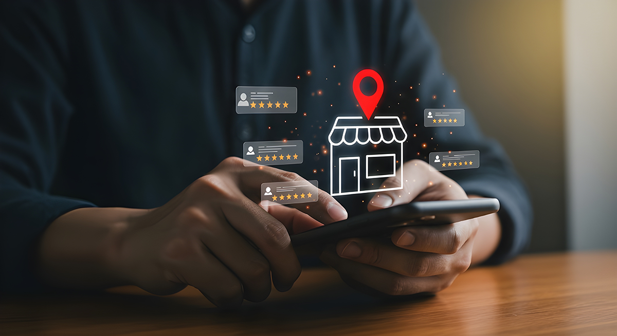 A person uses a phone with floating review cards, star ratings, and a local business location icon.